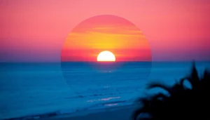 Beautiful circular image crop of a sunset over a beach, ideal for social media.